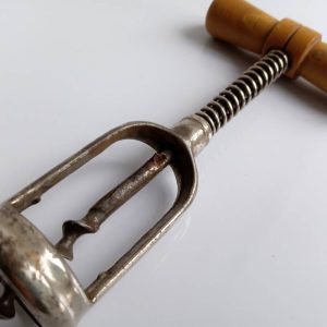 French / German vintage / antique corkscrew with spring to aid cork removal, and wood handle.