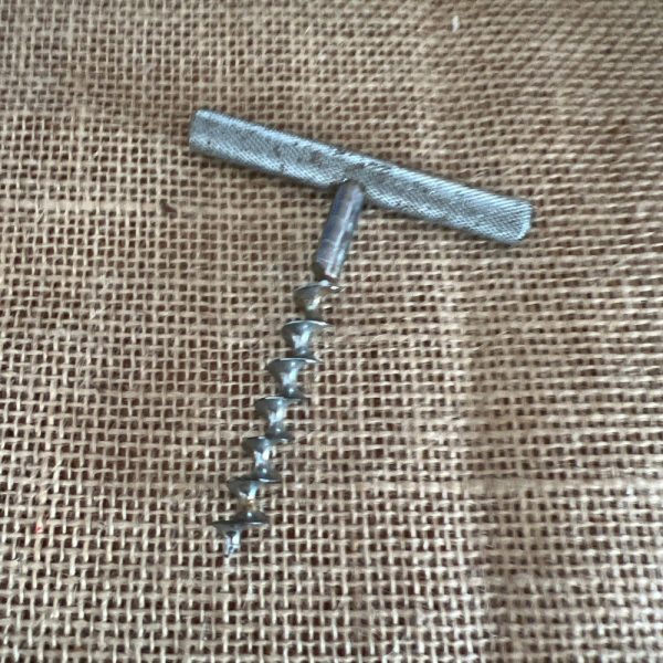 An industrial design design vintage  metal corkscrew