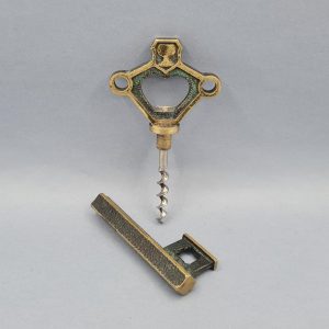 Corkscrew and bottle opener, in the shape of a key, in bronze, wine art, wine merchant accessory, corkscrew, cavatappi, korkenziheer, 1950